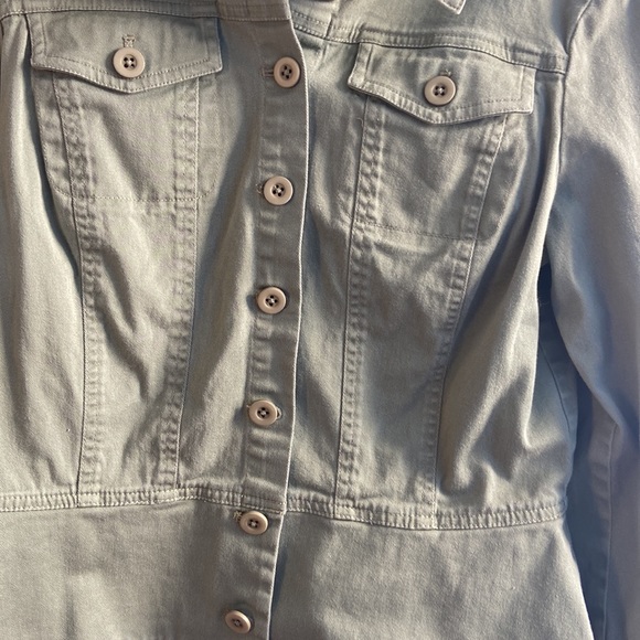 a green button down jacket - Picture 3 of 5